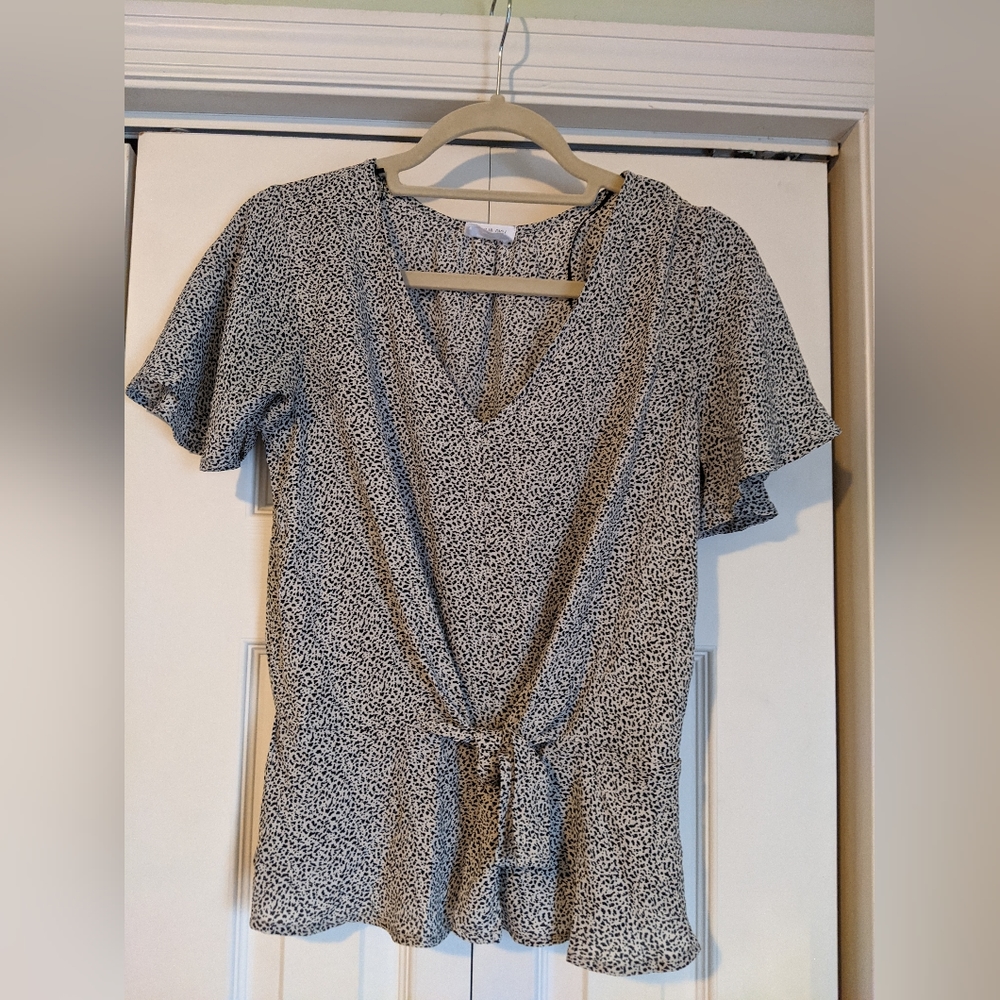 Animal print short sleeve, tie front blouse
